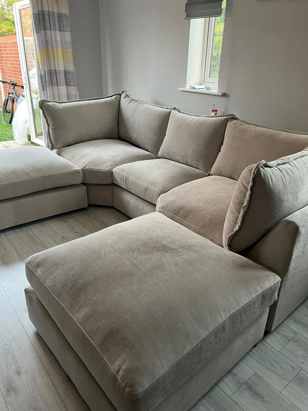 Neutral CK Living sofa with footstool in a customer home