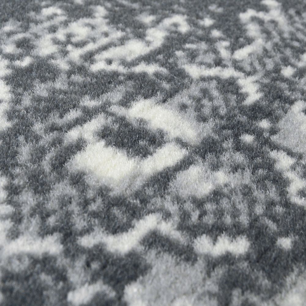 Luxury grey and white patterned sofa fabric texture close-up