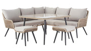Luxury outdoor wicker sofa set with glass table and matching stools, perfect for patio dining