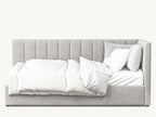 Modern grey upholstered bed with vertical panel headboard, white bedding, and decorative pillows