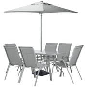 Grey outdoor dining set with 6 chairs, glass table, and large patio umbrella for garden or patio use