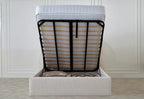 Upholstered ottoman storage bed with lifted mattress revealing spacious underbed storage