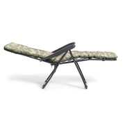 Foldable lounge chair with leaf-patterned cushion and black metal frame, ideal for outdoor relaxation.