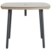 Wicker outdoor table with glass top and black metal legs, perfect for patio or garden use