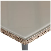 Wicker side table with beige glass top and grey leg, modern living room furniture