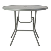 Grey round folding outdoor table with umbrella hole, ideal for patios and gardens