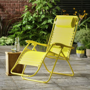 Bright yellow outdoor lounge chair on patio with greenery, perfect for garden relaxation and summer comfort.