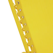 Vibrant yellow lounge chair with woven rope detailing and metal grommets, perfect for modern outdoor spaces.
