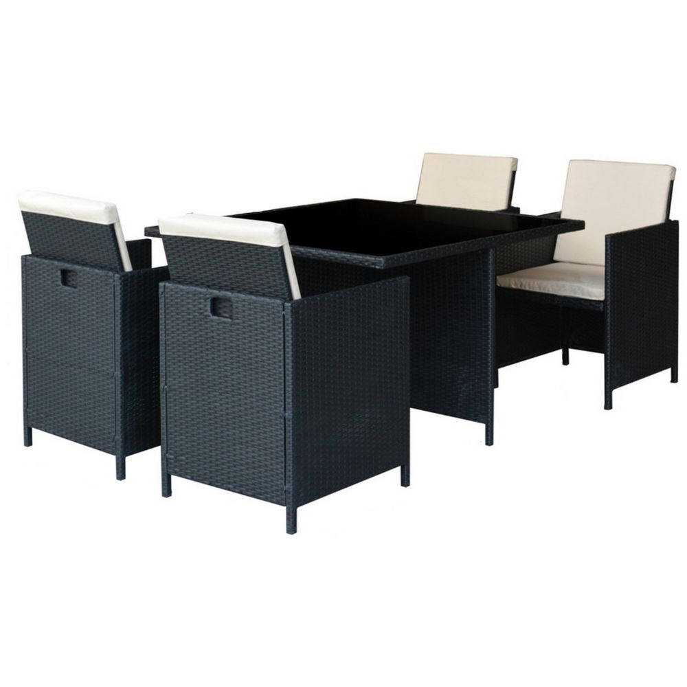 Black wicker outdoor dining set with 4 cream cushioned chairs and glass-top table