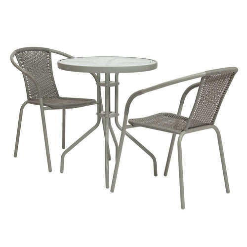 Grey outdoor bistro set with round glass-top table and two woven armchairs, perfect for patios or balconies.