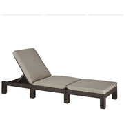 Dark wicker outdoor chaise lounge with beige cushions, perfect for patio relaxation.