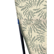 Cream sofa with green leaf print pattern, modern luxury furniture detail