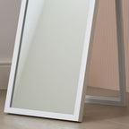 White full-length floor mirror with slim frame, modern bedroom decor