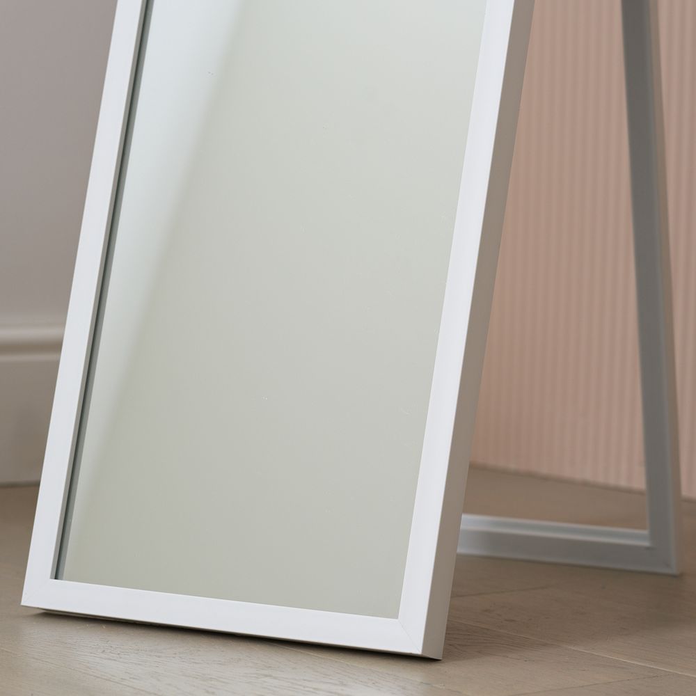 White full-length floor mirror with slim frame, modern bedroom decor