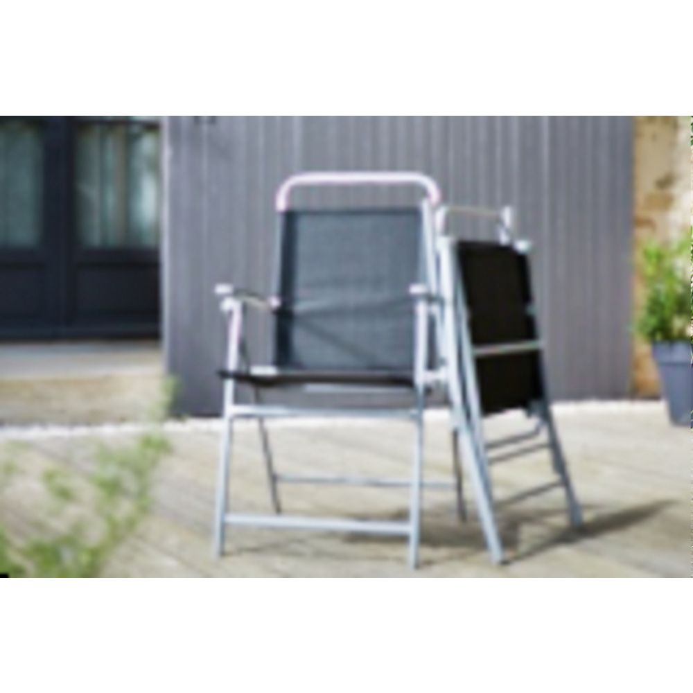 Black fabric folding outdoor chair with silver frame on patio, modern garden furniture