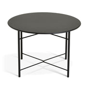 Modern black round coffee table with sleek metal legs for contemporary living rooms