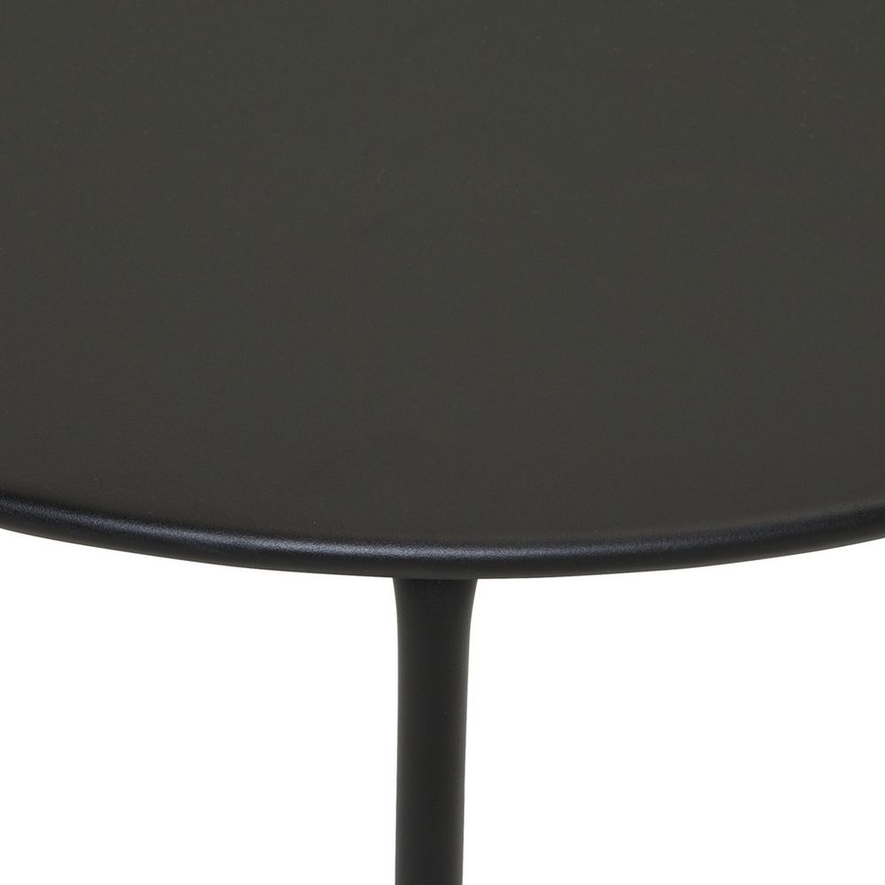 Black round side table with sleek metal leg, modern minimalist design for living room