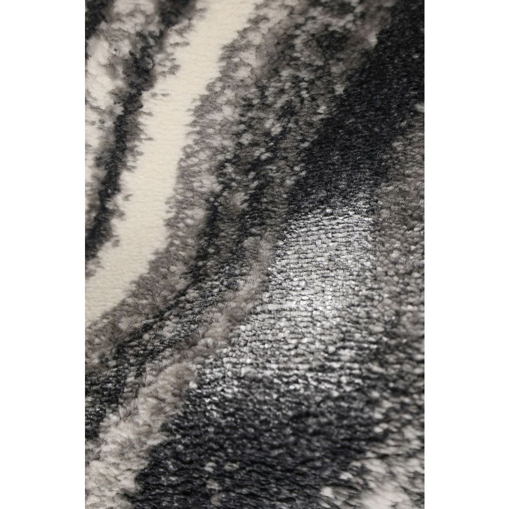 Luxury plush rug with abstract black, gray, and cream pattern for modern living spaces