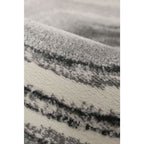 Soft grey and cream striped area rug with plush texture for living room or bedroom