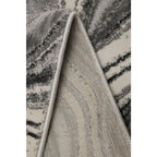 Luxury grey and cream abstract patterned rug with plush pile and stitched edge detail