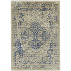 Blue and beige vintage-style area rug with distressed floral pattern, perfect for living room decor