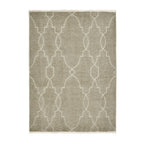 Beige area rug with white geometric lattice pattern and fringe edges, ideal for modern living rooms.