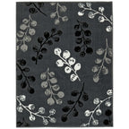 Gray area rug with black and white berry branch pattern for modern living room decor