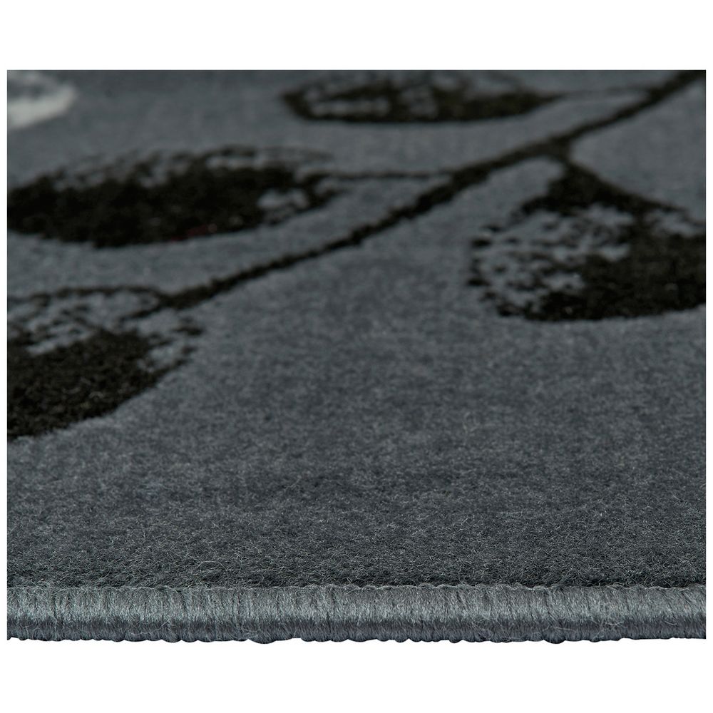 Grey area rug with black floral pattern, soft textured pile and stitched edge for modern living rooms