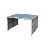 Grey wicker outdoor table with blue glass top, perfect for patio or garden furniture sets