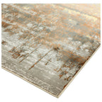 Modern abstract area rug with gray, beige, and rust tones, soft texture, and fringed edge for living room decor