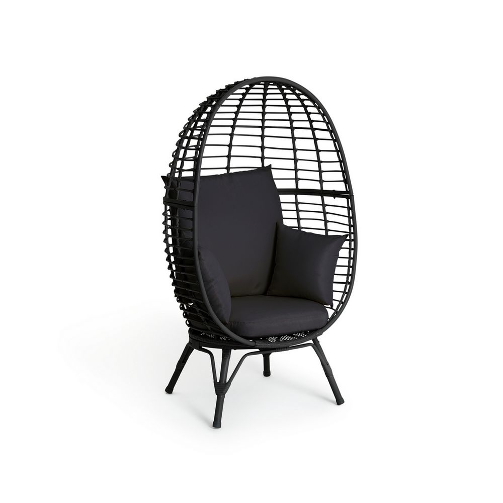 Black wicker egg chair with plush cushions, modern outdoor seating for luxury living spaces