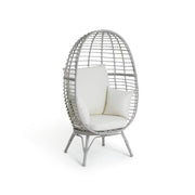 Gray wicker egg chair with white cushions, modern lounge seating for living room or patio