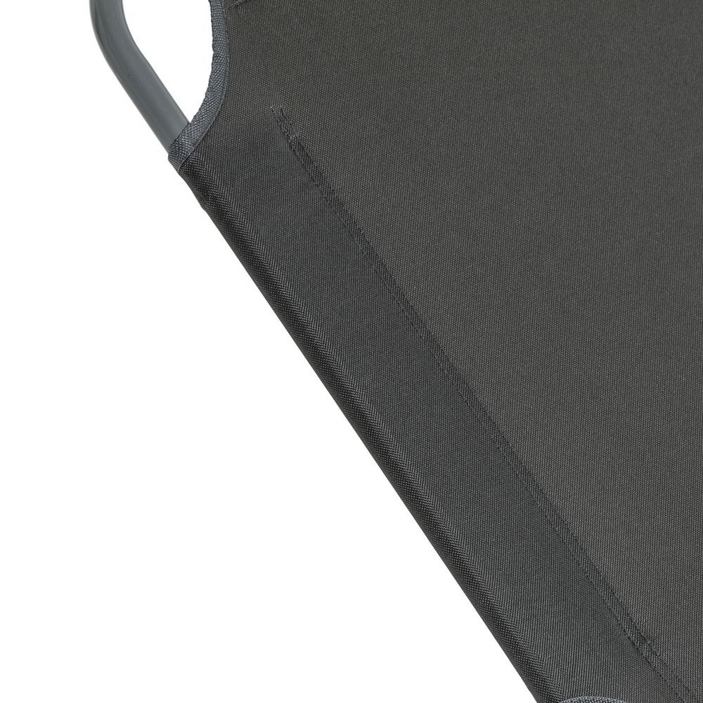 Dark grey fabric sofa detail with stitched seam and metal frame corner