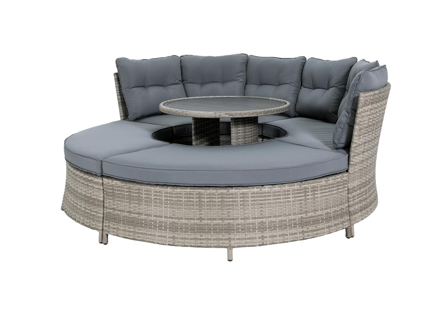 Circular outdoor wicker sofa with grey cushions and central table, perfect for garden lounging