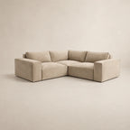 Beige L-shaped sectional sofa with plush cushions, modern luxury living room furniture