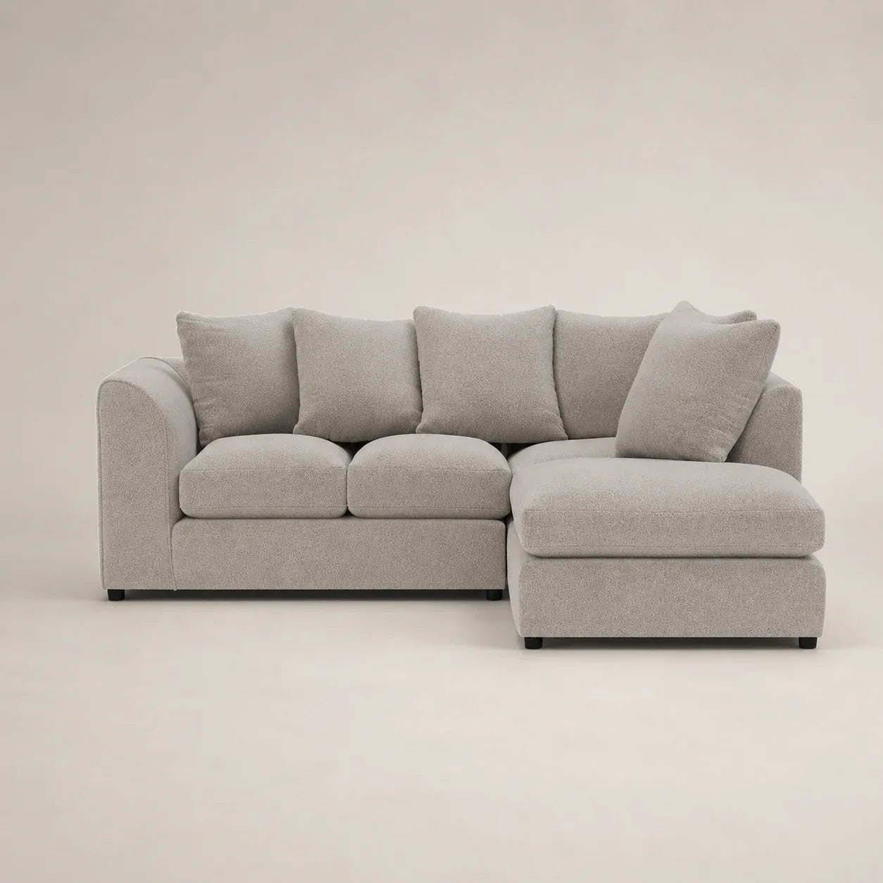 Luxury grey sectional sofa with chaise lounge, plush cushions, modern design for living room comfort