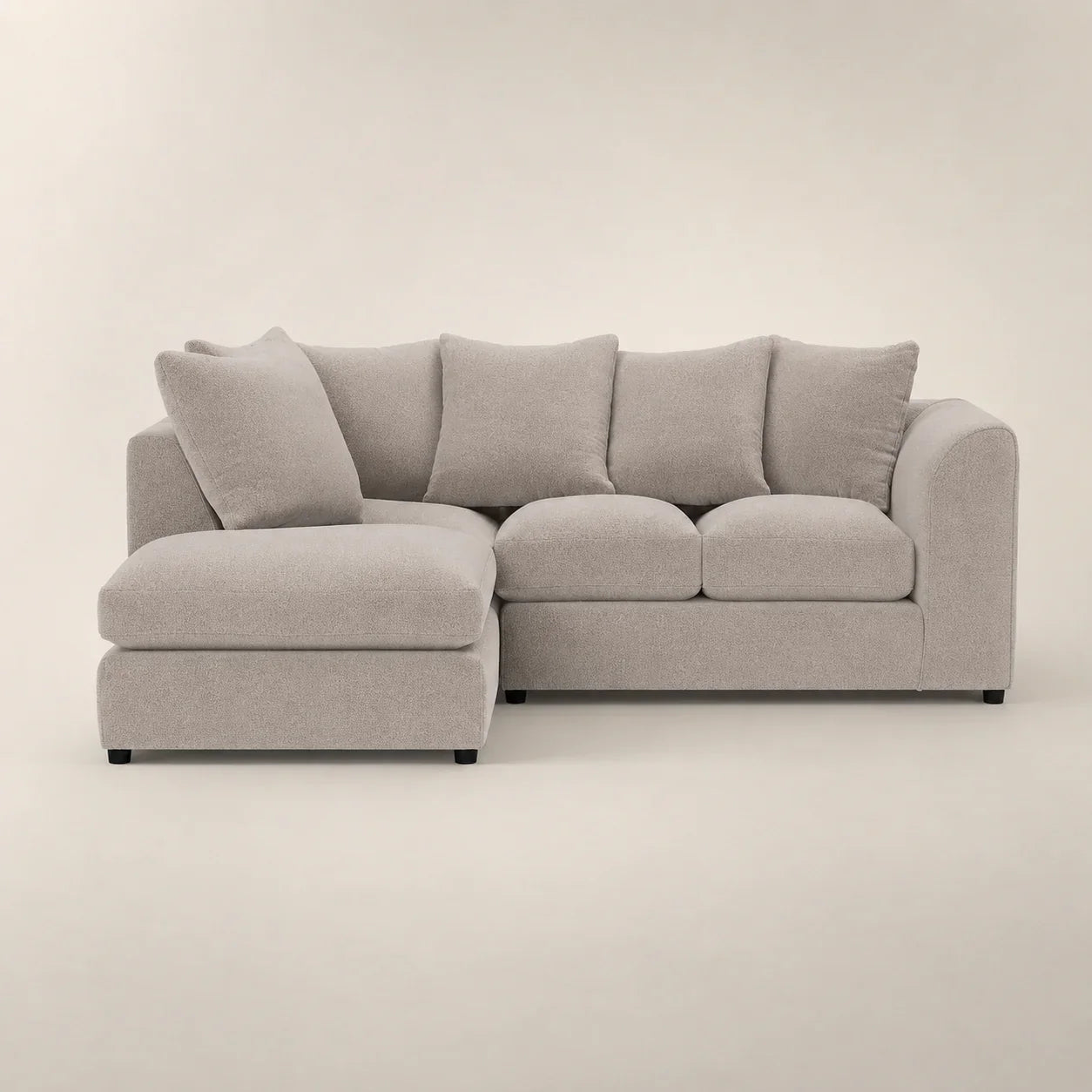 Luxury grey sectional sofa with chaise lounge, plush cushions, modern design for living room comfort
