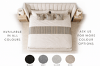 Modern luxury upholstered bed with neutral bedding, accent pillows, and color options shown.