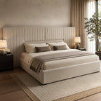 Luxury upholstered bed with tufted headboard, neutral bedding, and bedside lamps in modern bedroom