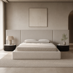 Luxury upholstered bed with modern headboard in neutral tones, styled in minimalist bedroom with side tables and art