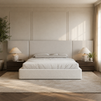 Luxury upholstered bed frame with neutral bedding, modern bedside tables, and ambient lighting in a serene bedroom.