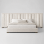 Luxury upholstered bed with tall panel headboard, neutral bedding, modern bedroom furniture