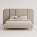 Luxury upholstered bed with tufted headboard, neutral tones, modern design for contemporary bedrooms
