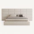 Luxury upholstered bed with tufted headboard, neutral bedding, and modern design for contemporary bedrooms.