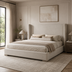 Luxury upholstered bed with tall headboard in neutral tones, styled in modern bedroom with natural light