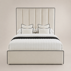 Luxury cream upholstered bed with black piping, white quilted bedding, and matching pillows for modern bedrooms