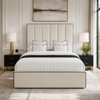 Luxury cream upholstered bed with black trim, white bedding, and modern nightstands in elegant bedroom