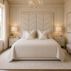 Luxury beige bed with chevron headboard, matching nightstands, and elegant chandelier in serene bedroom