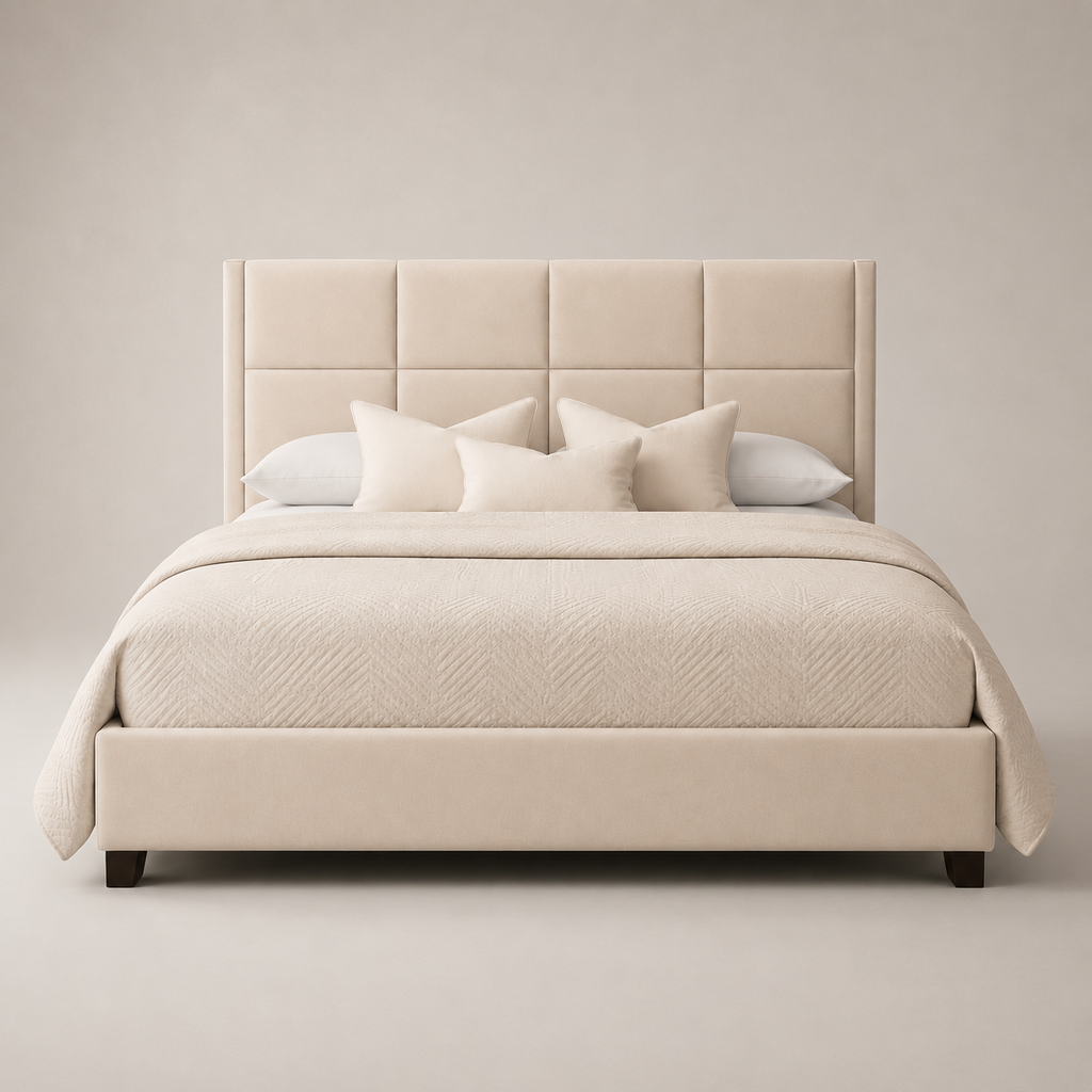 Luxury beige upholstered bed with tufted headboard, neutral bedding, and dark wood legs