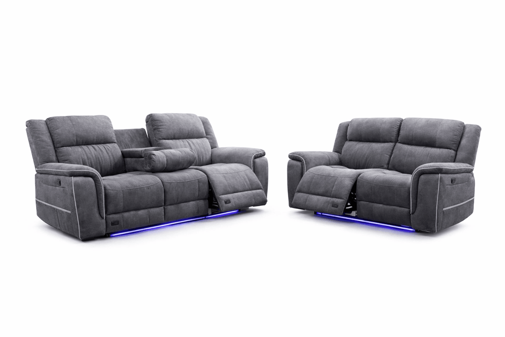 Grey reclining sofa set with LED lighting and plush cushions on a white background
